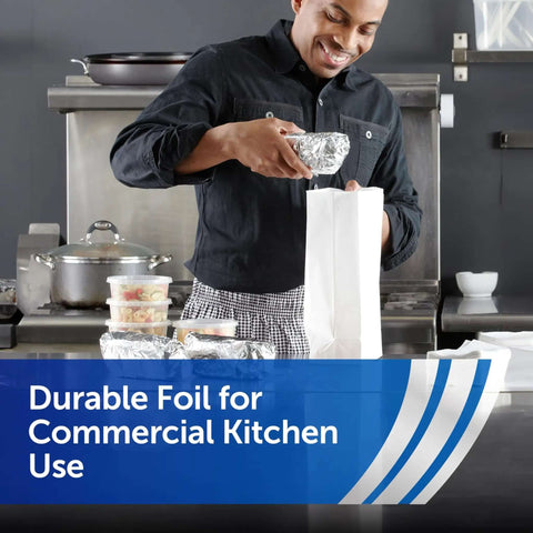 Person using Pre-Cut Aluminum Foil Sheets For Foodservice, 12 X 10.75 Inches, 500 Count Pop Up Dispenser in commercial kitchen