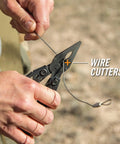 Suspension NXT 15 In 1 EDC Multitool With Needle Nose Pliers cutting wire outdoors