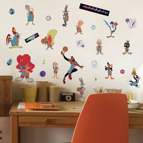 Space Jam LeBron Peel And Stick Giant Wall Decals Set on wall above desk, 21 characters and logos, sizes 2.13x2.17 to 12.48x35.58 inches.