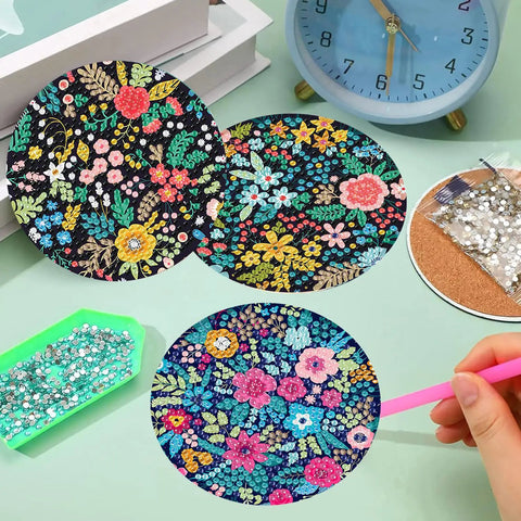 8 Pack Diamond Art Coasters Kit With Flower Designs, Cork Pads, Coaster Holder, Diamond Dots, Glue, Drill Pen, Diamond Tray, DIY Non Slip Coasters For Coffee Tables, Dope Gift For Adults And Beginners displayed on a table.