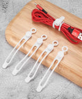 Must Have 25 Silicone Cable Ties Set For Home Office And Kitchen Reusable Wire Organizers next to red USB cable