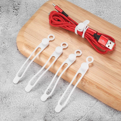 Must Have 25 Silicone Cable Ties Set For Home Office And Kitchen Reusable Wire Organizers next to red USB cable