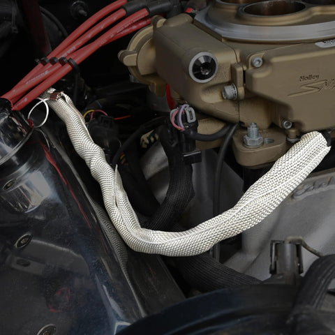 Front view of automotive wiring wrapped in DESIGN ENGINEERING RFI shield split sleeve; 1/2 in x 36 ft, silver tinned copper braid.