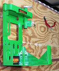 Xtreme Pro Series Backpack Blower Rack Version 3 with shielded locking system installed on a wooden shop wall