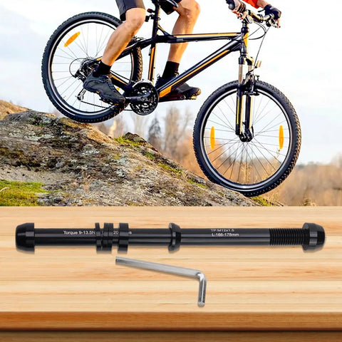 Thru Axle Skewer For Bike Trainers on wooden surface, CNC Machined Aluminum, Adjustable 12x142-148mm with P1.0 P1.5 P1.75 Pitch