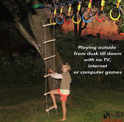 Child climbing Ground Anchored Rope Ladder For Kids, Kid-Friendly, 6.5 Ft Long By 16 In Wide, indoor outdoor use at dusk.