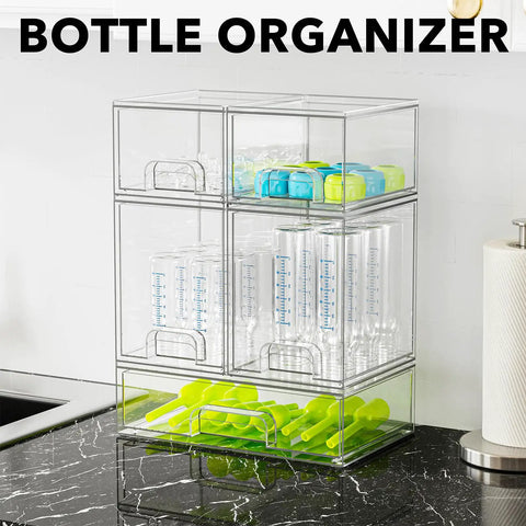 Multi Size Baby Bottle Storage Rack With Stackable Acrylic Drawers Keeps Your Counter Tight And Clutter Free Total Game Changer For Nursery Vanities Or Kitchen Cabinet. Clear acrylic drawer rack with baby bottles and utensils.