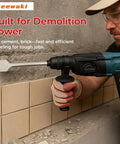 Person using SDS Plus Masonry Chisel Set 4-Piece Pro Grade Heavy Duty Chisel Bits for Hammer Drill to remove tile from wall