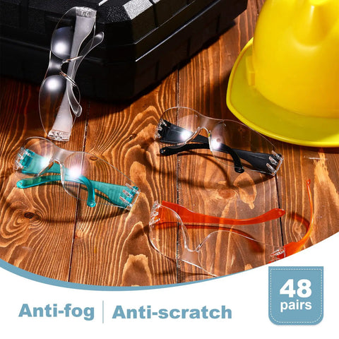 Bulk 48 Pairs Clear Safety Glasses Anti Fog Eyewear For Men And Women, 4 color options displayed on wooden table.
