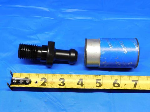 Badass Cat50 Coolant Through Mas Retention Knob Pairs With Beefy Pull Stud And Smooth 45 Degree Taper One Inch Eight Thread built tough next to a measuring tape.