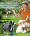Woman using Garden Hose Reel Cart With Wheels For Outdoor Watering Holds Up To Eighty Feet Of Five Eighth Inch Hose