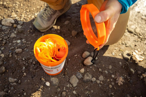 Orange Nautical Safety Kit For Paddle Sports And Boating No Brainer Gear with Floating Rope and Essentials in Use