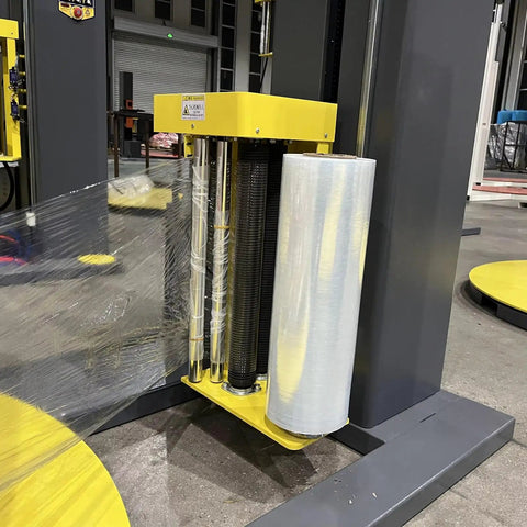 Straight Shots Automatic Shrink Wrap Machine Built Tough For Heavy Duty Pallet Wrapping And Seamless End Of Line Automation That Cuts Through The Daily Grind With Zero Hassle showing wrap roll holder and film dispensation system.