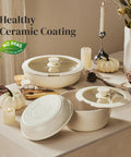 Ceramic Cookware Set With Detachable Handles, No Teflon Nonstick Pots And Pans, 16 Piece, PFAS PFOA PTFE Free, on a dining table.