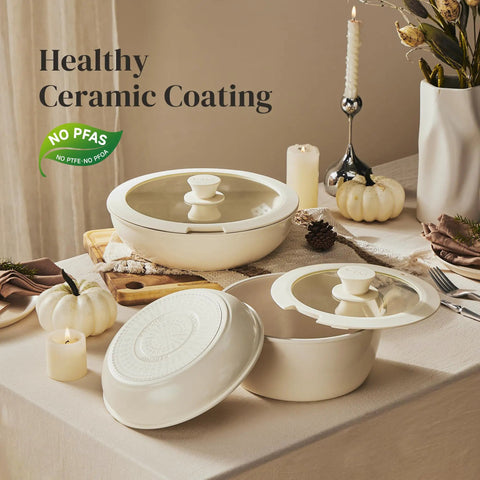 Ceramic Cookware Set With Detachable Handles, No Teflon Nonstick Pots And Pans, 16 Piece, PFAS PFOA PTFE Free, on a dining table.