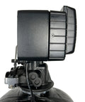 Side view of Fleck 5600SXT Metered Water Softener Valve With Digital Head And Battery Backup For On Demand Operation