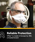 Man wearing N95 Disposable Respirator With VFlex 9105 Particulate Mask in industrial setting, emphasizing reliability.