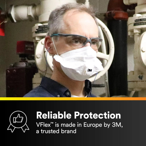 Man wearing N95 Disposable Respirator With VFlex 9105 Particulate Mask in industrial setting, emphasizing reliability.