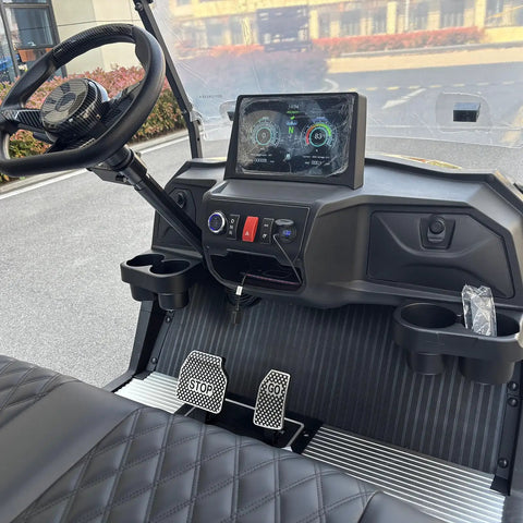 Interior view of Rugged Four Seater Electric Golf Cart With Powerful Ac Motor featuring dashboard controls and pedals.