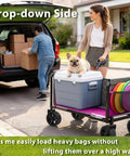 Pink Folding Wagon Cart with 5-Inch Wide Wheels carrying pet and cooler, easy fold design