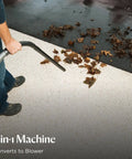 Person using Garage Pro Wall Mounted Wet Dry Vacuum And Blower With 12 Amp Power blowing leaves on driveway
