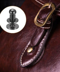 4mm Ball Head Rivet Set With Screws, 20 Pack Round Button Nipple Rivets For DIY Leather Craft Handbags And Belts, shown on a leather strap