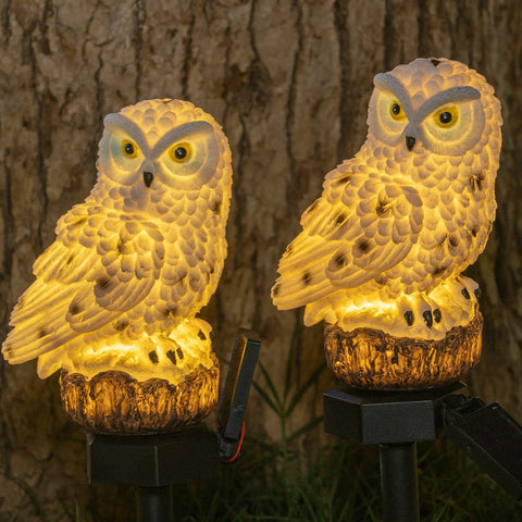 Owl Figure Solar LED Lights 2 Pack Garden Decor With Stakes Battery Free Outdoor Yard Pathway Lighting glowing at night