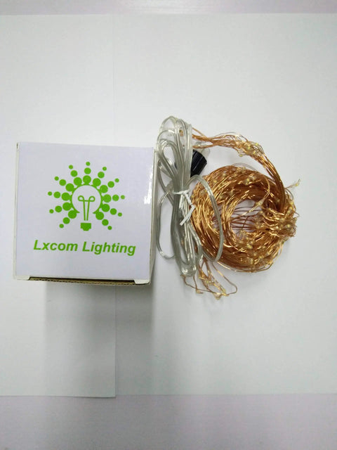 Plug In Fairy Lights With 6.56 Ft Copper Wire, 14 Branch Strands And 280 LEDs, Warm White Twinkle String Lights coiled next to box