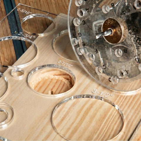 A Damn Sharp Transparent Acrylic Router Template For Woodworking Boasts Thirteen Circle Sizes packed on a wood surface with visible circle sizes.