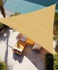 Customizable Outdoor Shade Sail 20 By 20 By 28.3 Feet Triangle Sunshade Canopy For Patio UV Resistant Blocks Up To 95 Percent Of Harmful Rays Breathable HDPE Fabric Keeps Airflow Cool And Comfortable Sand Color installed over patio area.