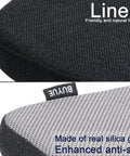Close-up of black magnetic bar stool cushion highlighting breathable woven fabric and anti-slip silicone bottom.