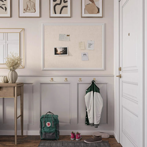 40 By 30 Inch Bulletin Board With White Wood Frame installed in a hallway, displaying notes and photos, showing practical home use.