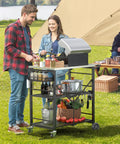 Sturdy Folding Outdoor Grill Cart With Locking Wheels Ready To Roll 27 By 18 Inch Stainless Steel Top 3 Shelf Rolling BBQ Stand