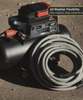 Kink Free Hybrid Air Compressor Hose Three Eighth By Fifty Foot attached to a compact oil-free pump, showing flexibility and durability.
