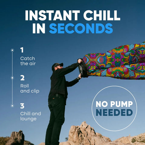 Man inflating No Pump Setup Inflatable Couch Lounger for Beach Camping Festivals and Tailgates with Psychedelic Print