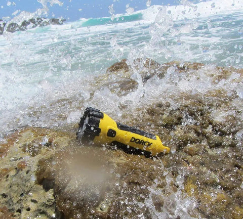 150 Lumen Floating Water Resistant LED Flashlight With Carabiner Clip Yellow Built No BS Outdoors It Floats In Water on rocks