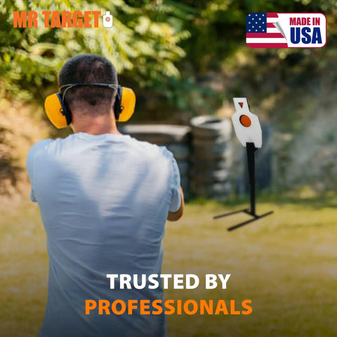 Person aiming at American Made Beefy AR500 Steel Target Sniper Style Silhouette 12 By 20 Inch with 6 Inch Center Paddle