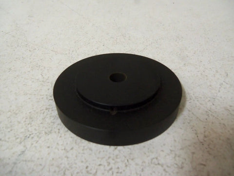 Badass Phenolic Measuring Wheel With A Tough 1/2 Inch Bore And Rock Solid 12 Inch Circumference Build, black circular base with center hole.
