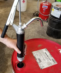 Guardian Lever Action Drum Transfer Pump For 16 To 55 Gallon Drums With 2 Inch Bung And Bushing, 10 Oz Per Stroke in use.