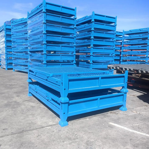 Heavy Duty Cold Rolled Steel Foldable Storage Cage Built Like A Tank Collapsible Industrial Bin For Warehouse Logistics Premium Stackable Crate Box, blue stacked bins in warehouse.