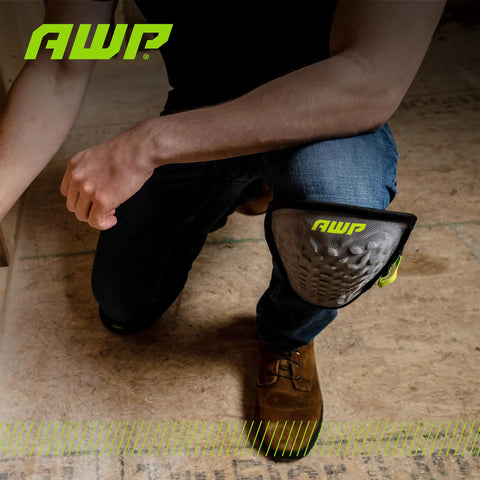 Person wearing Gel Pro Flooring Knee Pads With Dual Layer Gel And Foam Padding For All Day Comfort, kneeling on wooden floor, AWP logo visible.