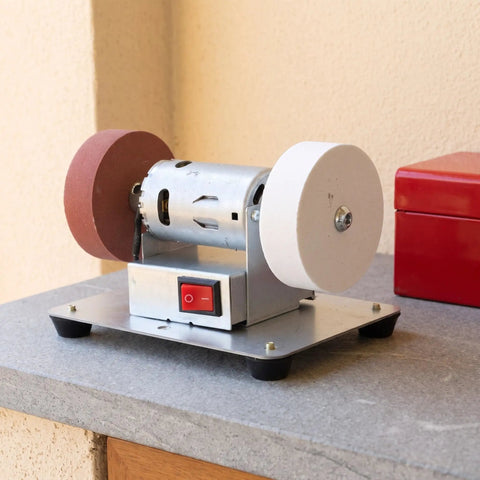 Compact Desktop Sanding And Polishing Machine With Easy As Pie Plug And Go Setup on a countertop with multi angle adjustments.