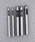 Leather Hole Puncher Set Five Piece With Steel Hollow Round Punch Tools 1-5mm on gray textured background