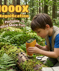 2 In 1 Digital Microscope And Telescope For Kids Portable USB STEM Toy 1000X Magnification And 10X Viewing Ideal Birthday Gift For Boys And Girls Aged 3 8 12 Explore Cells Fibers Rocks And More In a Fun Hands On Discovery Kit. Boy using portable digital microscope outdoors