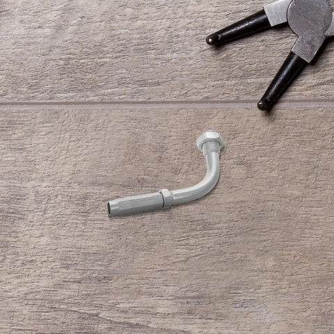 Upgrade Your Ride With This Badass Adjustable Aluminum Clutch Cable Adjuster Screw 90 Degree Setup in silver on wood surface.