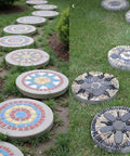 Installed Six Piece Round Stepping Stone Mold Set With Thick Plastic Concrete Molds In 10.63 Inch 11.81 Inch And 12.99 Inch Sizes For DIY Garden Pathway Outdoor Walkway Paving Durable Cement Casting Molds For Easy Release showing colored designs.
