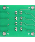 Back view of 4 Channel Optocoupler Isolator Module With Level Converter For PLC Signals, PNP NPN to PNP, 12V to 3.3V, 45x72x18mm.