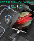 Dual Port USB C Car Charger 36W Hella Fast Charging Plug N Play Cigarette Lighter Adapter With PD QC 3.0 Power Delivery For iPhone 15 14 13 Samsung Galaxy S24 S21 iPad Pixel Road Trip Essential Grey connected to a smartphone.