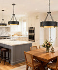 Modern Drum Chandelier With Four Lights In Black And Gold For Dining Room Farmhouse Industrial Pendant Lighting in kitchen setting