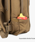 MOLLE Compatible Diaper Backpack for Dads With Built-In Changing Mat And Stroller Straps, Rugged 600D Tactical Daypack in Coyote Brown with expandable bottle pocket.